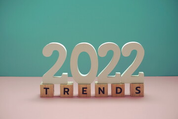 Trends 2022 alphabet letter on blue and pink background