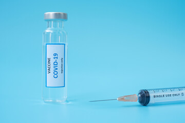 COVID-19 Vaccine vial and injection Needle Syringe against Coronavirus infection in hospital...