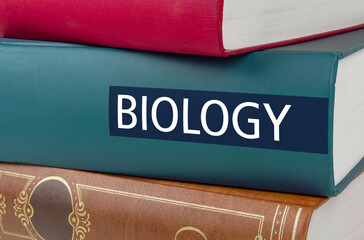 A book with the title Biology written on the spine