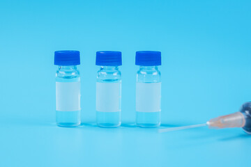 Vaccine vial dose with shot drug needle syringe in hospital laboratory. Medical, health, Vaccination and immunization concept