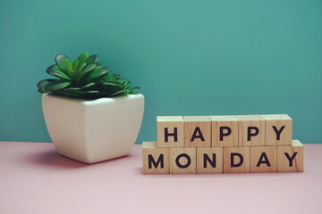 Happy Monday alphabet letter on blue and pink background