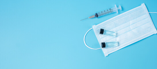 Vaccine vial dose with shot drug needle syringe in hospital laboratory. Medical, health,...