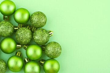 Christmas background in olive color. Christmas toys. Place for text