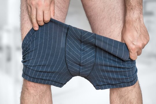 Man puts on or undressing his underpants