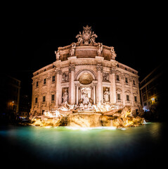 Fototapeta na wymiar Fountain di Trevi viewed at night in Rome, Italy