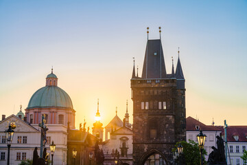 Fototapeta na wymiar Charles bridge tower at sunrise in Prague, Czech Republic