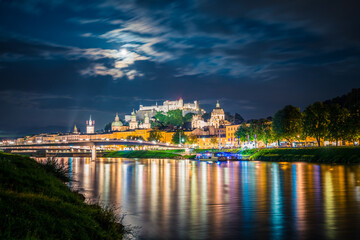 Salzburg at night. City skyline with Festung Hohensalzburg castle, Austria