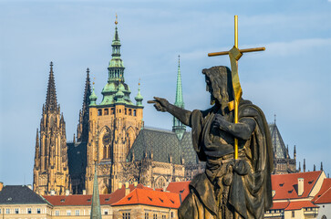 Charles's bridge statue and Prague's castle. Czech Republic