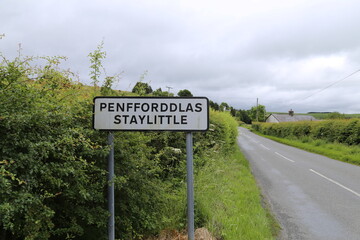 A village sign at Staylittle Penfforddlas, Powys, Wales, UK.