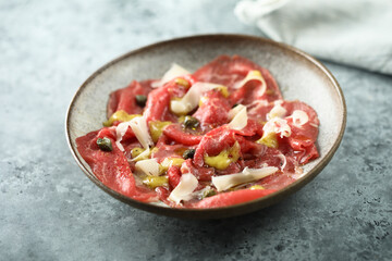 Traditional homemade beef carpaccio with capers