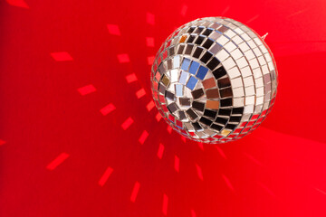 Retro mirror disco ball sun glare reflection copy space. Disco night life party dance 70s 80s concept. festive new year christmas xmas. abstract red minimal background, banner, frame, card