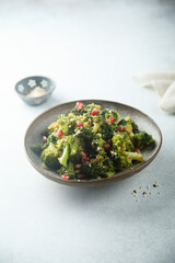 Broccoli with pomegranate seeds