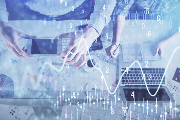 Double exposure of man and woman working together and financial chart hologram drawing. market analysis concept. Computer background. Top View.