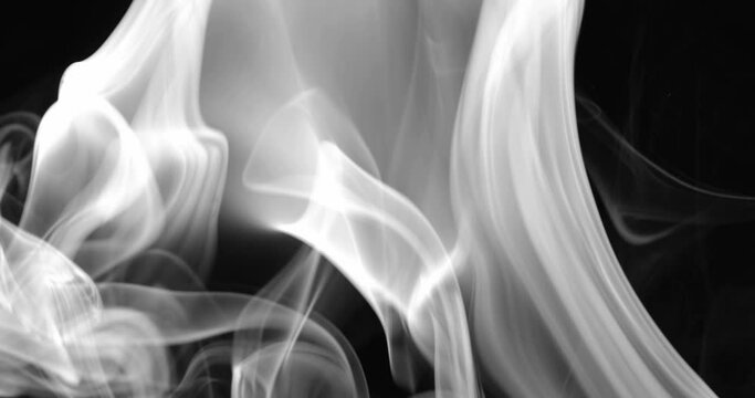Smoke background. White smoke floating through space against black background	