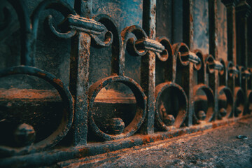 window with a rusty grille