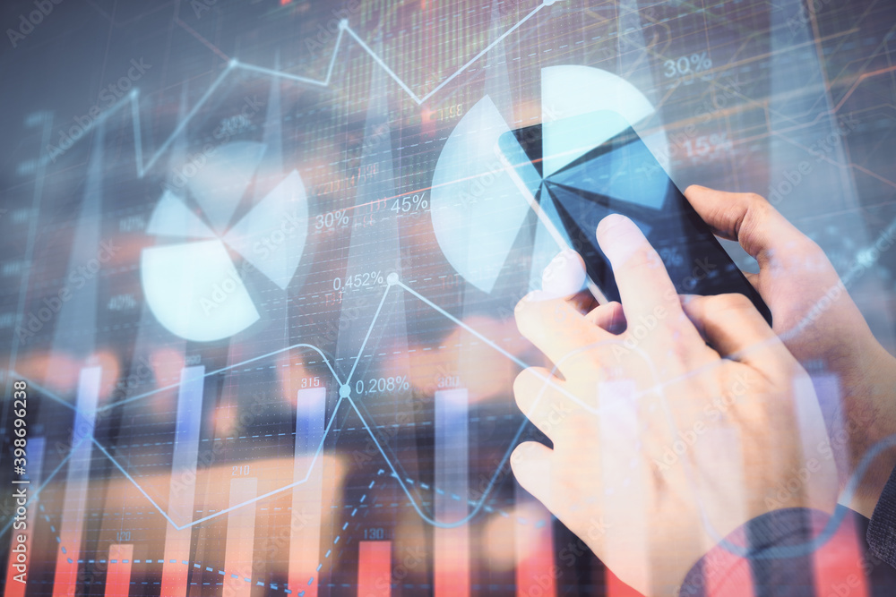 Poster double exposure of man's hands holding and using a digital device and forex graph drawing. financial