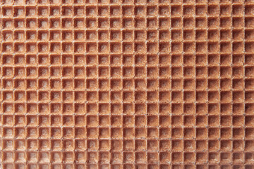 Empty wafer texture as background. Closeup view of chocolate waffle. Top view