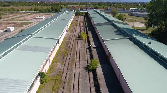 flight along train tracks and roofs in Mannheim