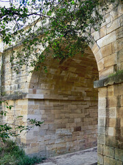 A view of Lennox Bridge at Glenbrook in the Blue Mountains. This is the oldest standing stone arch bridge on the Australian mainland