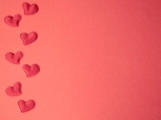 Many of little hearts on a pink background. Romantic Valentine's day cards, invitations or posters. Space for text. Flat lay