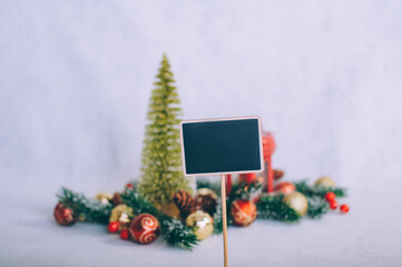 Mock up nameplate on the background of the Christmas composition.