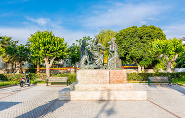 A statue front of mediaval gate in Kos Island. Kos Island is populer tourist destination in Greece.