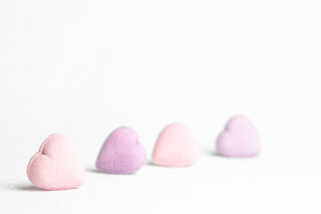 Pink heardts  on white glitter   background  . Valentines day concept  .