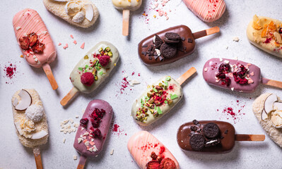 Variety of colored popsicle on a stick. Top view.
