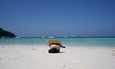 person relaxing on the beach