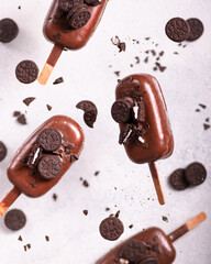 Popsicle ice cream cake with chocolate and cookies