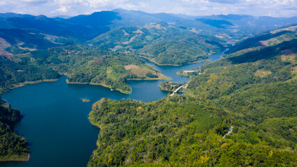 Naklejka na ściany i meble landscape aerial view mae suai dam andthe route with bridges connecting the city in valley