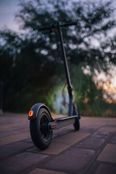 scooter from the back. Lights on. Concept technology.Transport