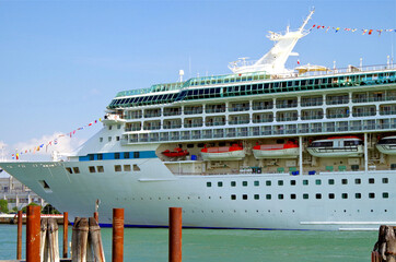 Modern Royal Caribbean cruiseship or cruise ship liner in port of Venice, Italy during summer...