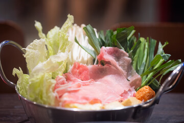 Shabu Shabu or Sukiyaki, a popular dish of pork, beef and fresh vegetables.