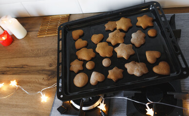 A traditionalist concept. decoration of freshly baked Christmas cookies. handmade holiday sweets close-up.Making holiday Christmas handmade sweets for gifts