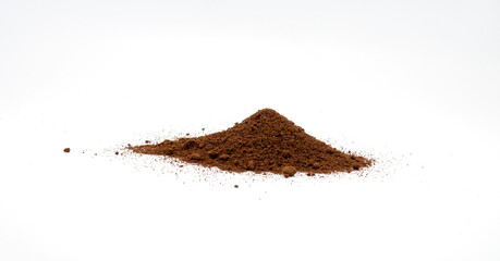 A pile of ground coffee on white background