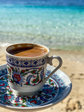 Beautiful holiday concept photo of a summer vacation with Turkish coffee time on the beach seaside