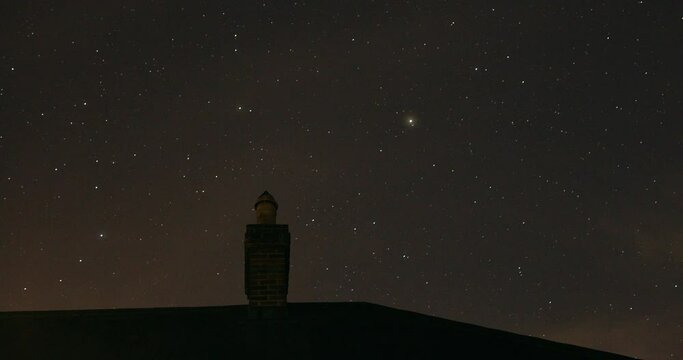 Chimney against sky with stars, Compton Abbas, Dorset, UK