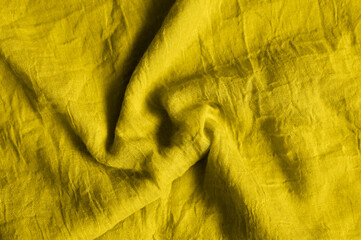 background of bright yellow cotton wrinkled fabric cloth. toned in illuminating and ultimate gray,...