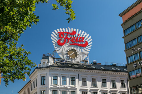 Freia clock at the top of a building in Oslo.