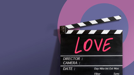Naklejka premium Love text title on film slate