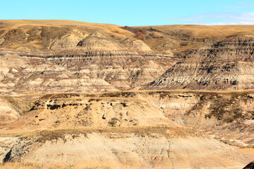 Drumheller badlands at the Dinosaur Provincial Park in Alberta, where rich deposits of fossils and dinosaur bones have been found. The park is now an UNESCO World Heritage Site.
