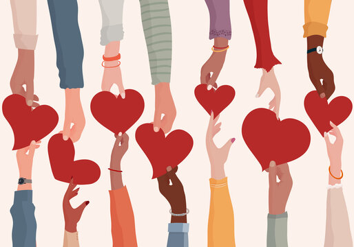 Concept of charity donation and help or social assistance.Voluntary hands that donate a heart to other hands as a metaphor for charity and contribution.Social work and voluntary work. Ngo