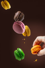 Close up vertical image of Floating macarrons 