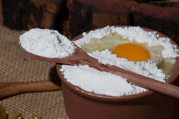 panettone and chocotone on rustic table. ingredients on the table