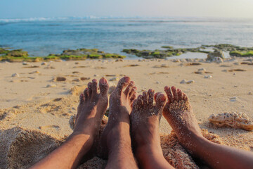 dirty feet exposed to beach sand