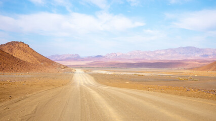 Fototapeta na wymiar Gravel road of Namibia from Ai-Ais to Aus in Richtersveld Transfrontier Park.