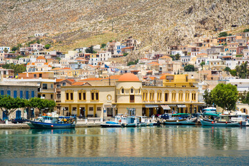 Fototapeta na wymiar Kalymnos harbour view from sea. Kalymnos Island is populer tourist destination in Greece. 