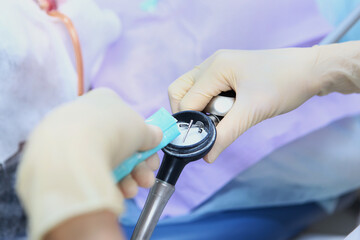 Professional dental cleaning in a dental clinic. A special tool for brushing your teeth....