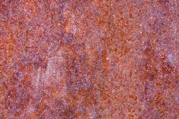 Grunge texture of old rusty metal with scratches and cracks.